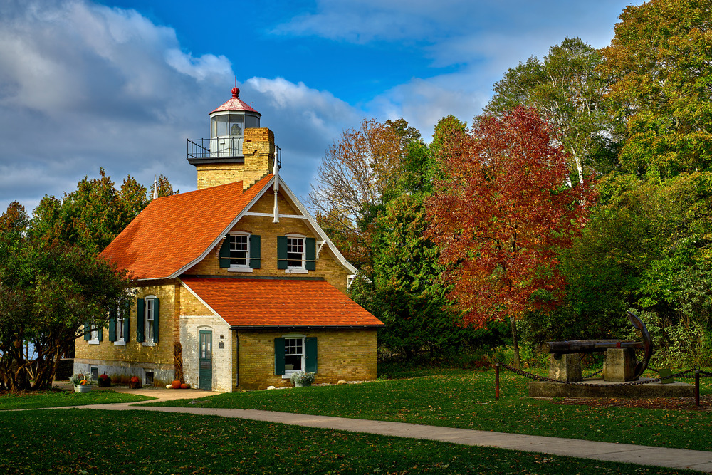 eagle bluff lighthouse during autumn in wisconsin