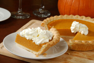 Slice of pumpkin pie on a plate