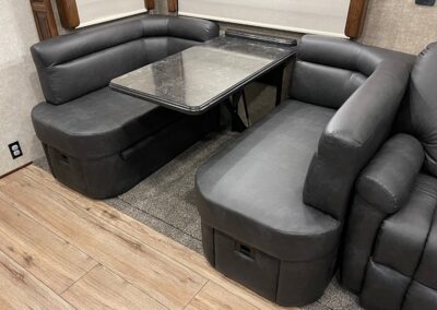 black rv dining table and booth